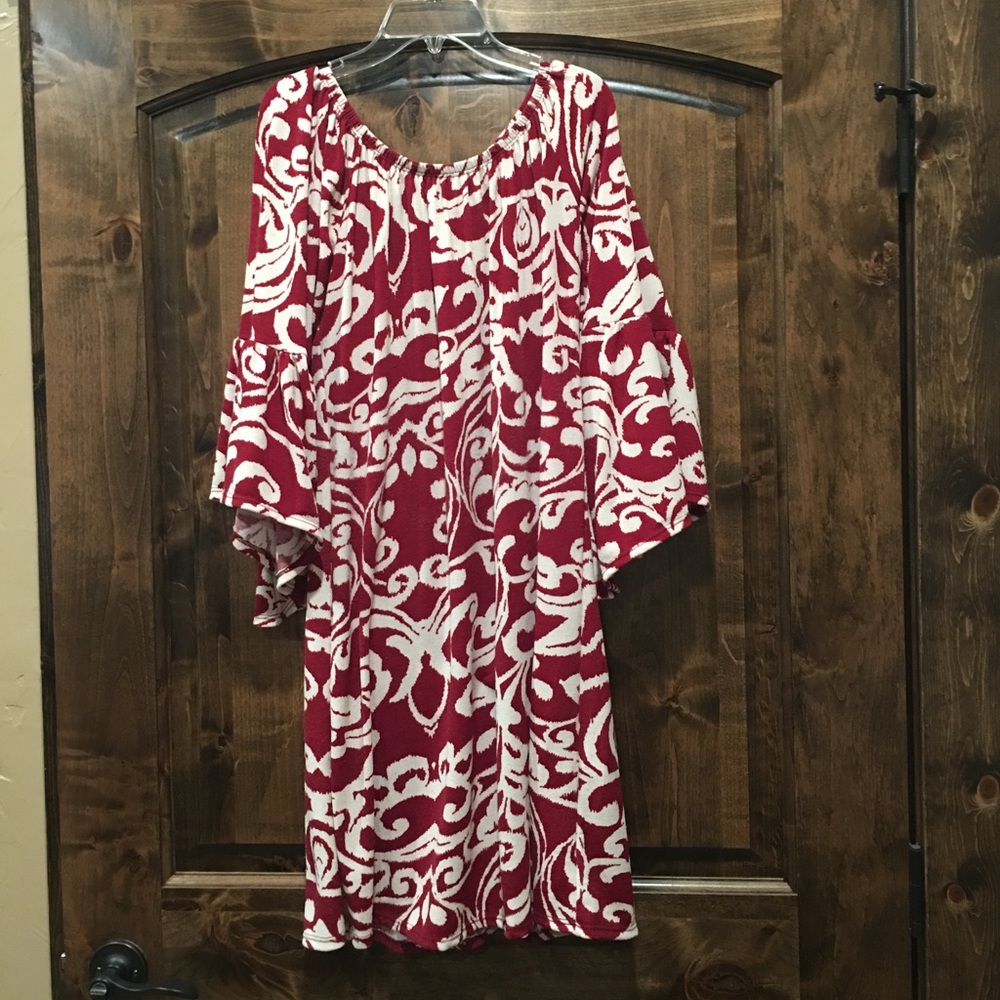 Cute maroon dress with bell sleeves.